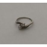 A diamond and pearl two stone crossover ring set i