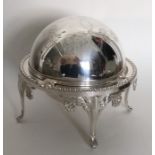 A silver plated revolving butter dish. Est. £10 -