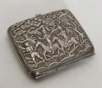 A heavy Chinese silver cigarette case decorated wi
