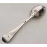 A mint condition Georgian silver shell back spoon.