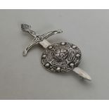 A Celtic silver sword and shield brooch. Approx. 2