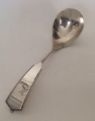 A stylish Danish silver ladle with twisted stem. A