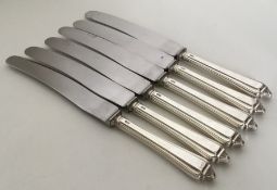 A good heavy set of six silver handled tea knives.