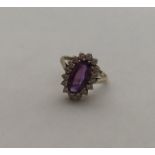 A 9 carat amethyst and white sapphire cluster ring