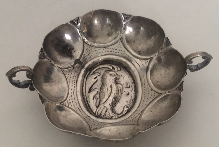 A Continental two handled silver bowl decorated wi