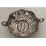 A Continental two handled silver bowl decorated wi