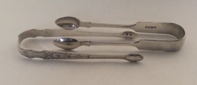 A pair of attractive bright cut silver sugar tongs