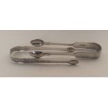 A pair of attractive bright cut silver sugar tongs