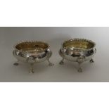 A pair of heavy oval Georgian silver salts. London