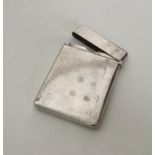 A heavy Chinese silver card case with hinged top.