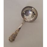 A good quality silver and silver gilt sifter spoon