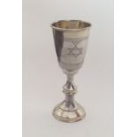 A silver engraved miniature Kiddush cup. Approx. 2