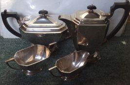 A heavy Art Deco four piece silver tea service. Bi