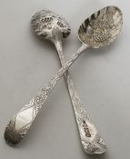 An attractive pair of silver berry spoons with vin