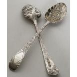 An attractive pair of silver berry spoons with vin