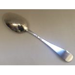 A Georgian silver Hanoverian pattern spoon. London