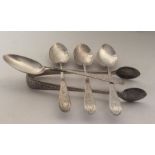 A set of four silver teaspoons together with match