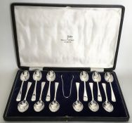 A good boxed set of twelve silver coffee spoons to