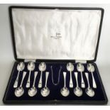 A good boxed set of twelve silver coffee spoons to