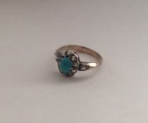 A turquoise and diamond cluster ring. Approx. 2.9