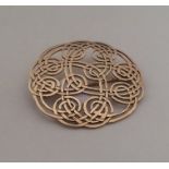 A Celtic 9 carat brooch. Approx. 7.7 grams. Est. £