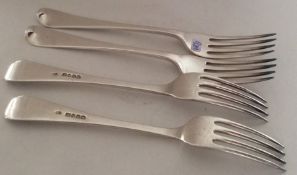 A set of four OE pattern silver forks. London. By