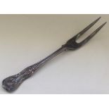 A Kings' pattern silver carving fork. London. By J