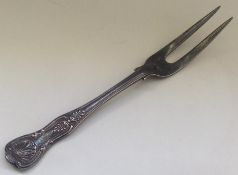 A Kings' pattern silver carving fork. London. By J