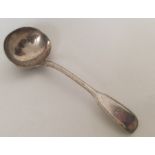 A fiddle and thread pattern silver sauce ladle. Lo