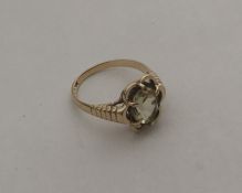 A 9 carat stylish citrine ring. Approx. 2.6 grams.