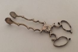 A good pair of Georgian silver sugar scissors. Lon