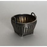 A miniature Chinese wicker silver basket with gilt