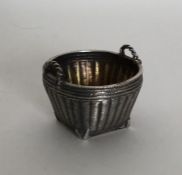 A miniature Chinese wicker silver basket with gilt