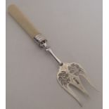 A silver pierced fork on tapering handle. Sheffiel