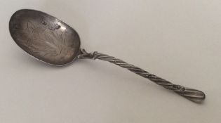 A Russian silver preserve spoon with twisted stem.