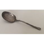 A Russian silver preserve spoon with twisted stem.