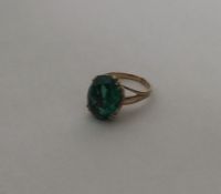 A 9 carat single stone ring in claw mount. Approx.