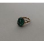 A 9 carat single stone ring in claw mount. Approx.