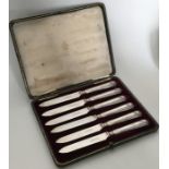 A cased set of six silver and shell mounted tea kn