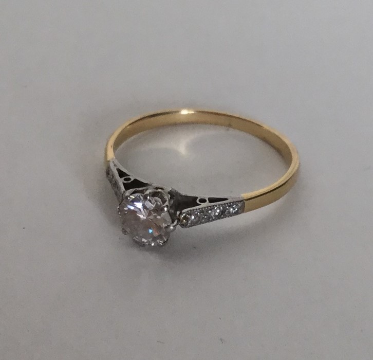 An attractive diamond single stone ring in claw mo