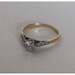 An attractive diamond single stone ring in claw mo