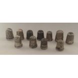 A group of silver engraved thimbles. Various dates
