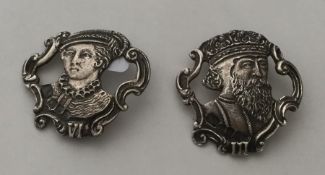 A pair of stylish silver buttons in the form of a