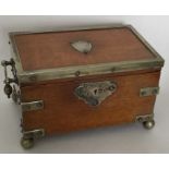 An oak and silver plated jewellery box with fitted