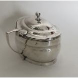 An oval Georgian silver boat shaped mustard pot. L