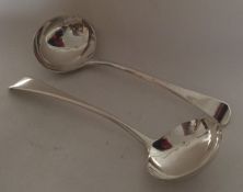 A pair of Georgian silver OE pattern sauce ladles.