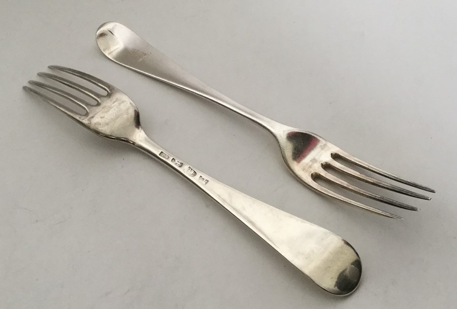 A pair of heavy OE pattern silver forks with crest