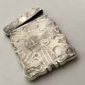 A rare silver card case attractively decorated wit