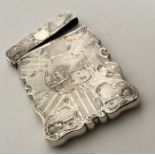 A rare silver card case attractively decorated wit