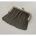 A silver mesh purse with loop top. Approx. 50 gram
